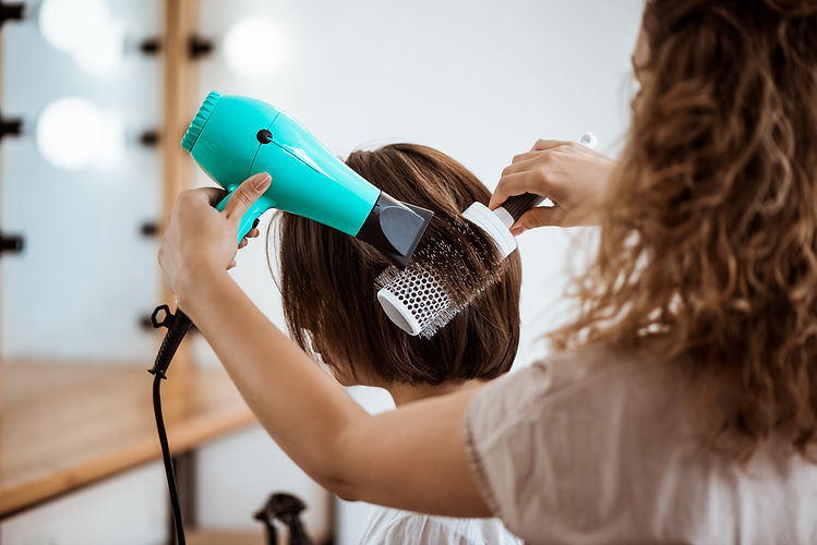 female-hairdresser-making-hairstyle-brunette-woman-beauty-salon.jpg