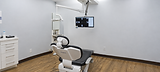Modern Dental Operatory with X-Ray Monitor.png