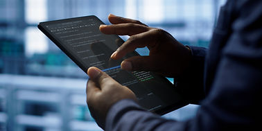 close-up-shot-worker-server-room-using-tablet.jpg