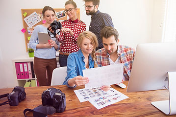 coworkers-office-with-photo-cameras-computer.jpg