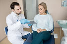 woman-watching-tablet-with-dentist.jpg