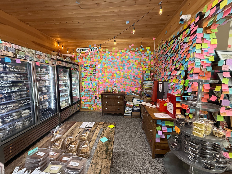 All those post-it notes are thank yous from customers. I got a slice of raspberry cheesecake. I ate it before I thought about taking a picture! It was very good though..