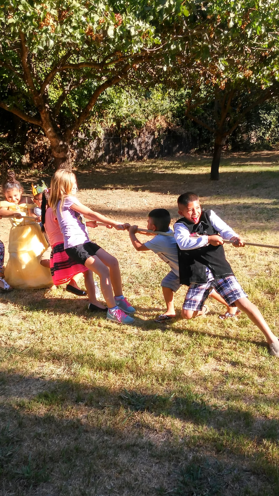 tug of war w kids facing each other