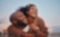 Happy black couple, love and hug laughing in joyful happiness for bonding time together in