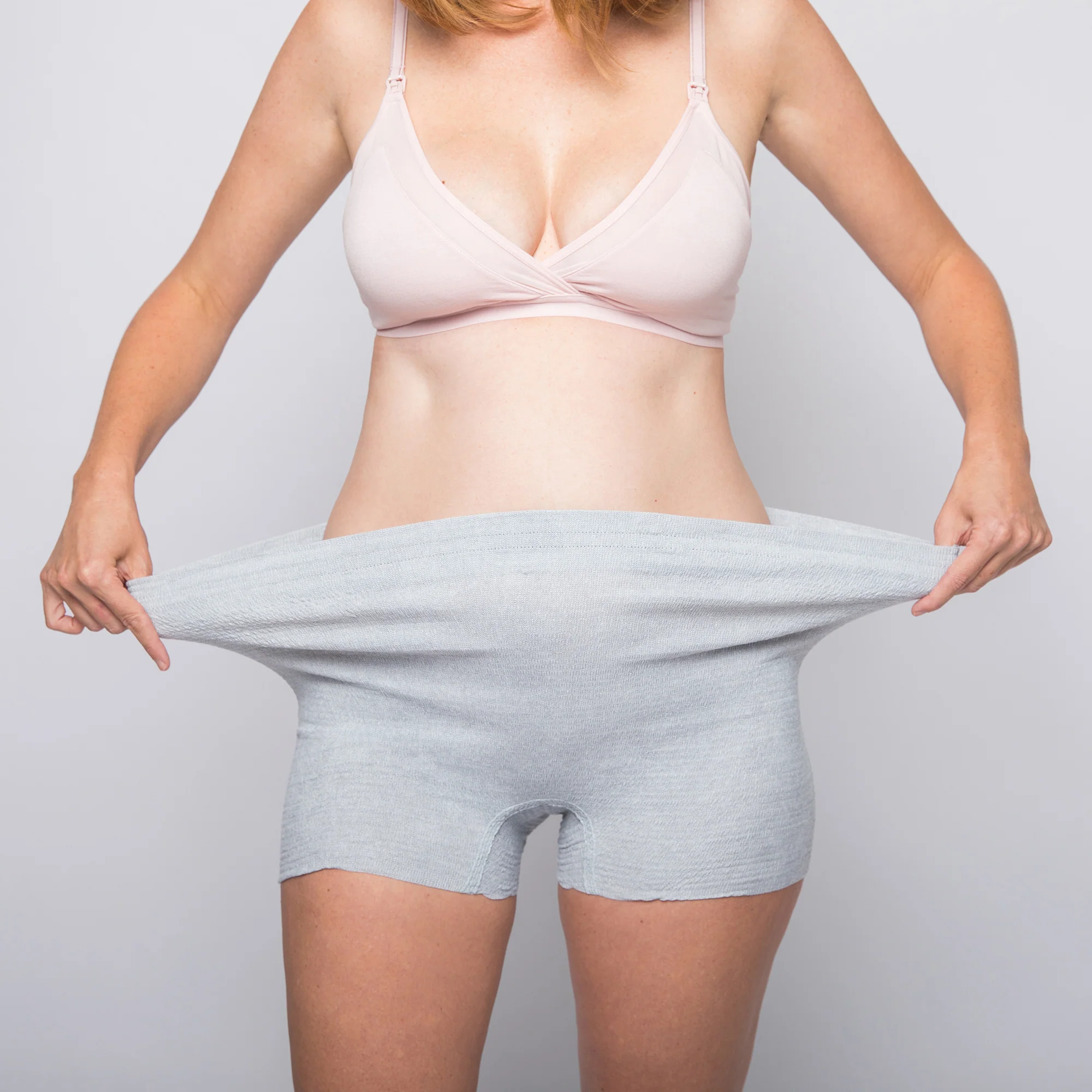 pregnant woman wearing stretchable shorts