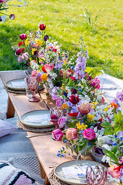 Colourful wedding table flowers.jfif