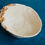 Thumbnail: Designer Ivory Bowl with 24 Carat Gold Flower