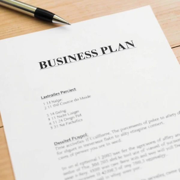 Picture of business plan on legal paper.