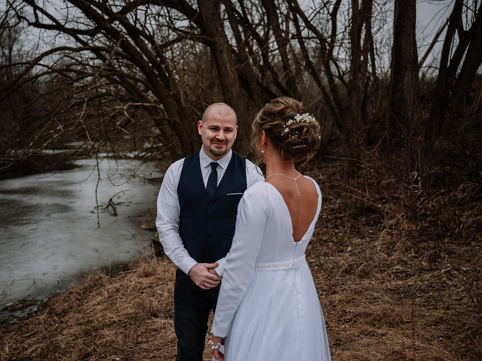Emotional first look between bride and groom before their Wisconsin wedding.