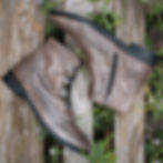 stivaletti in pelle con bottone gioiello