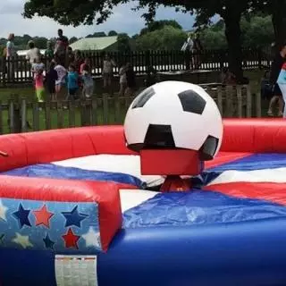 Rodeo Football outdoors on a sunny day at an event for corporate client