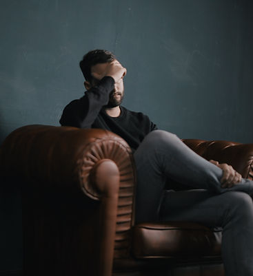 Thinking Man on Couch_edited.jpg