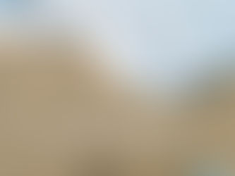 Waves washing onto the sandy shore with the text 'Take a break from spring break' and FIT30A’s logo in the bottom right corner.