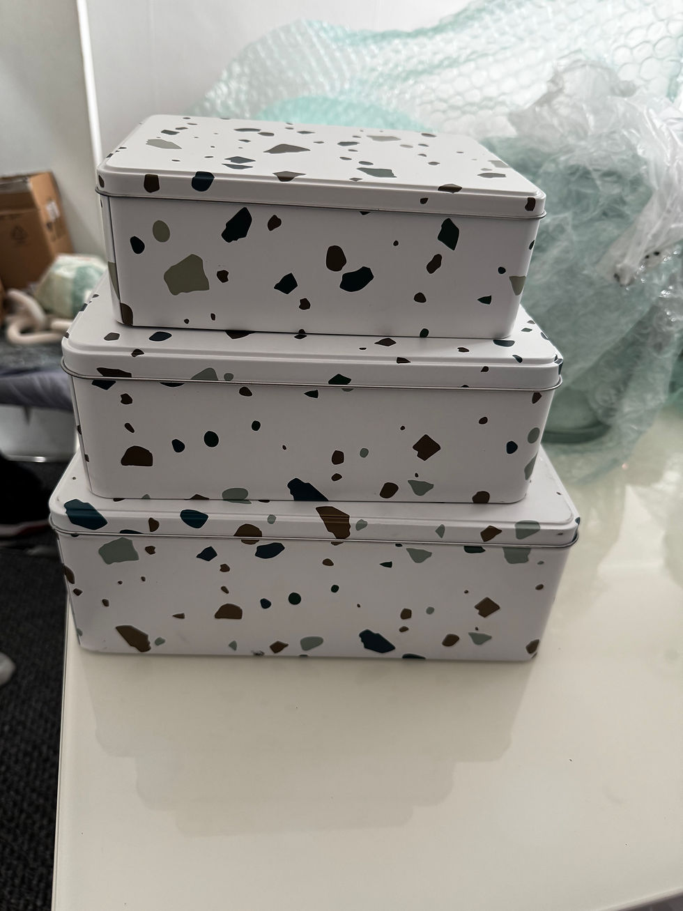 Thumbnail: 3 rectangular boxes in different sizes; earthy terrazzo pattern