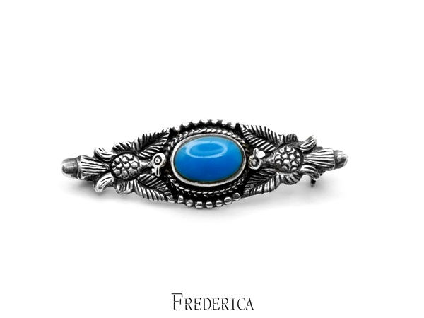 סיכה מכסף זוג ציפורים משובצת באבן כחולה