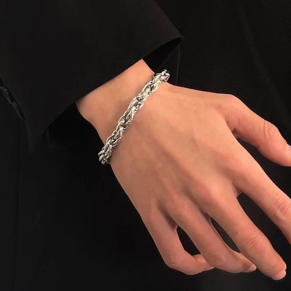 Thumbnail: Twisted diamond-shaped titanium steel bracelet for men and women