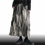 Thumbnail: Unique pleated skirt for the autumn and winter seasons. It features a thick, wat