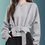 Thumbnail: Trendy batwing sleeve long-sleeve solid color top with a lstylish belt
