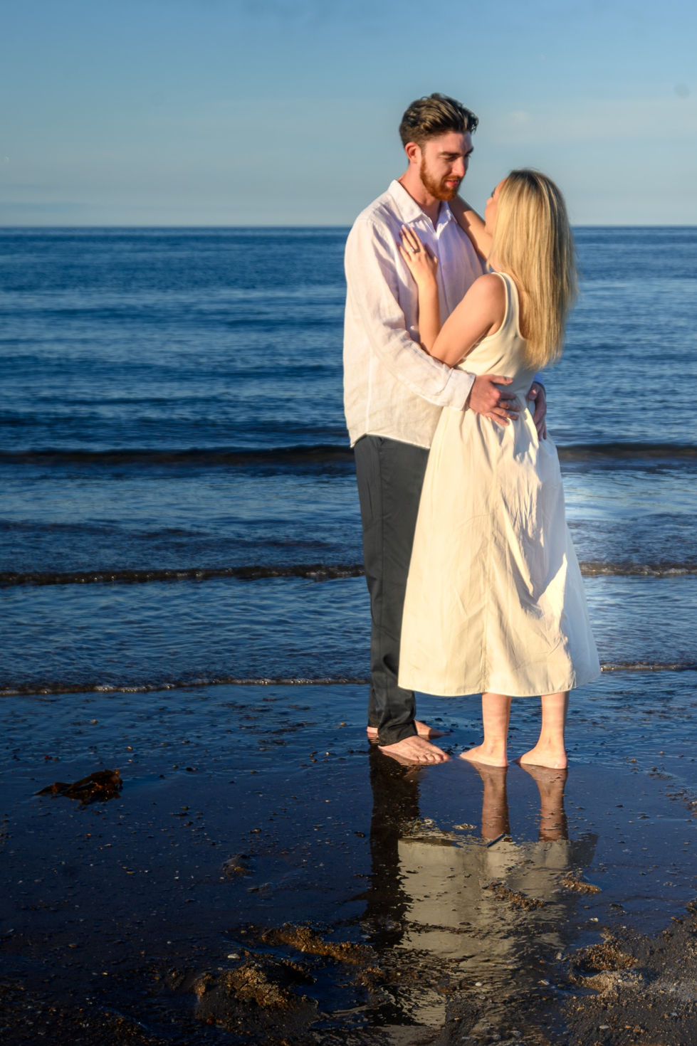 04-almore-druridge-bay-beach-engagement-couple-reflection