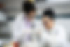 2 female student researches in lab