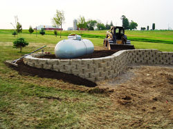 Tiered Retaining Wall by Rock Landscape & Gardens Inc.
