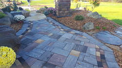 Paver Patio by Rock Landscape & Gardens Inc.