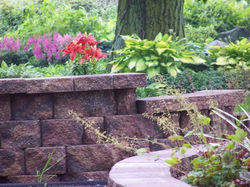 Tiered Retaining Wall by Rock Landscape & Gardens Inc.