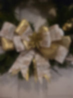 white and gold bow close up.jpg