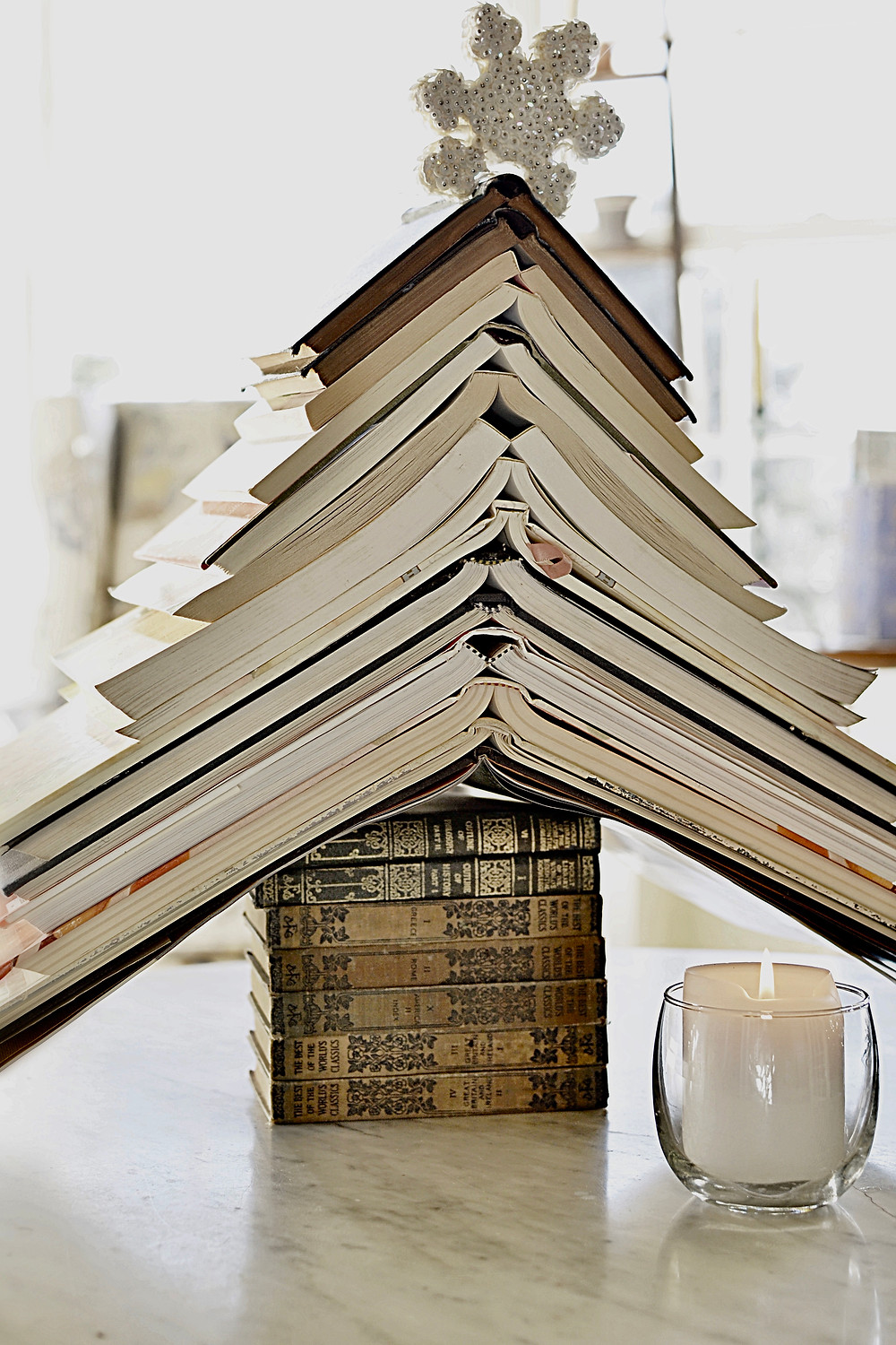 Book Christmas tree with star on top.