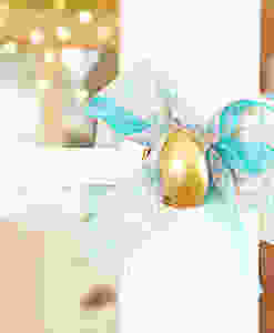 Teal burlap bow on doorknob