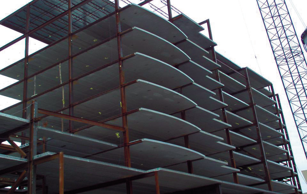 Building under construction with steel beams and concrete floors, sgbsintl.