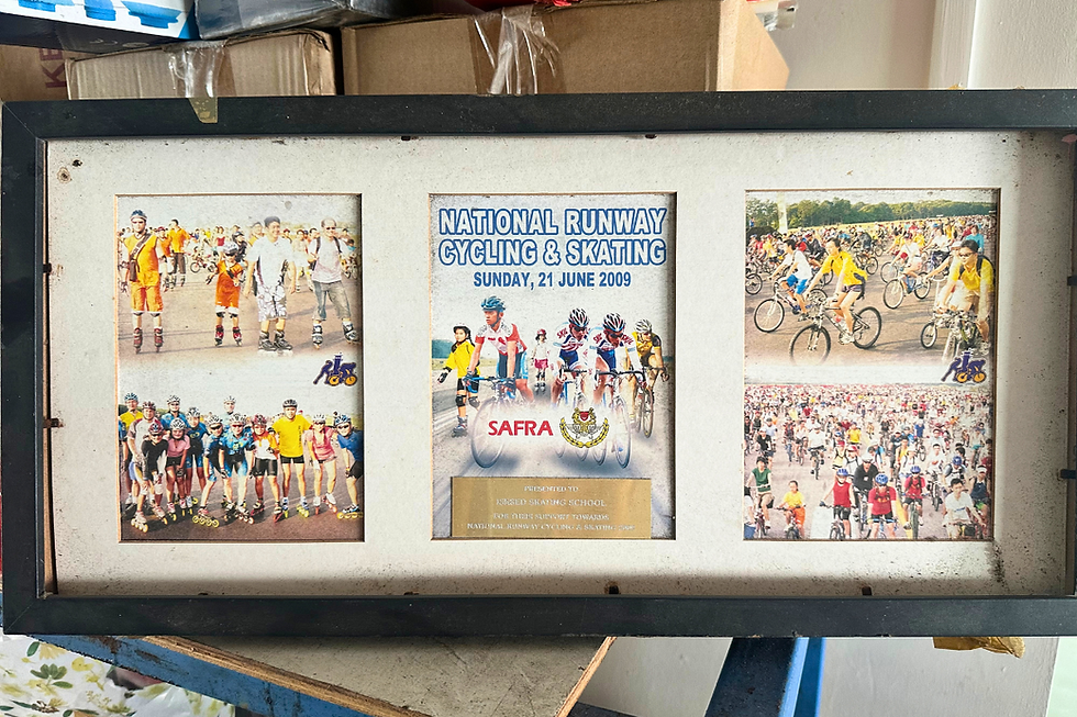A framed souvenir from the National Runway Cycling & Skating event in 2009 that Mr Lim's skating company helped to sponsor