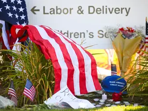 U.S. flags are placed at a memorial for Charlie Kirk Thursday in Orem, Utah. (Alex Goodlett/AP)