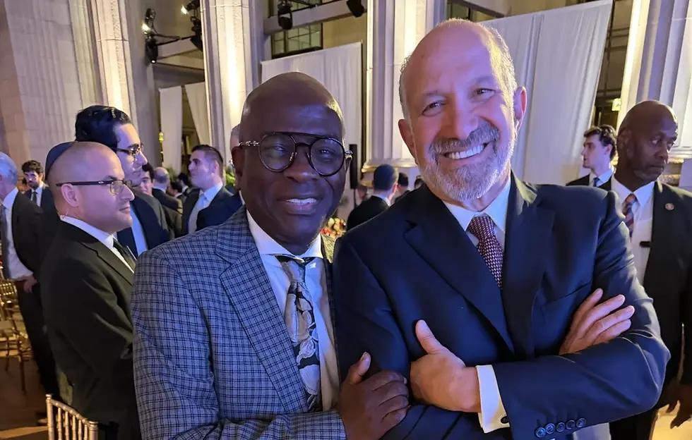 Baltimore Sun co-owner Armstrong Williams, left, and Commerce Secretary Howard Lutnick attended the 2-26 Lamplighter Awards held Sept. 23 at the Andrew W. Mellon Auditorium in Washington D.C.