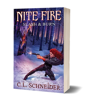 Cover of Slash & Burn featuring a red haired woman in a snowy forest shooting a gun.