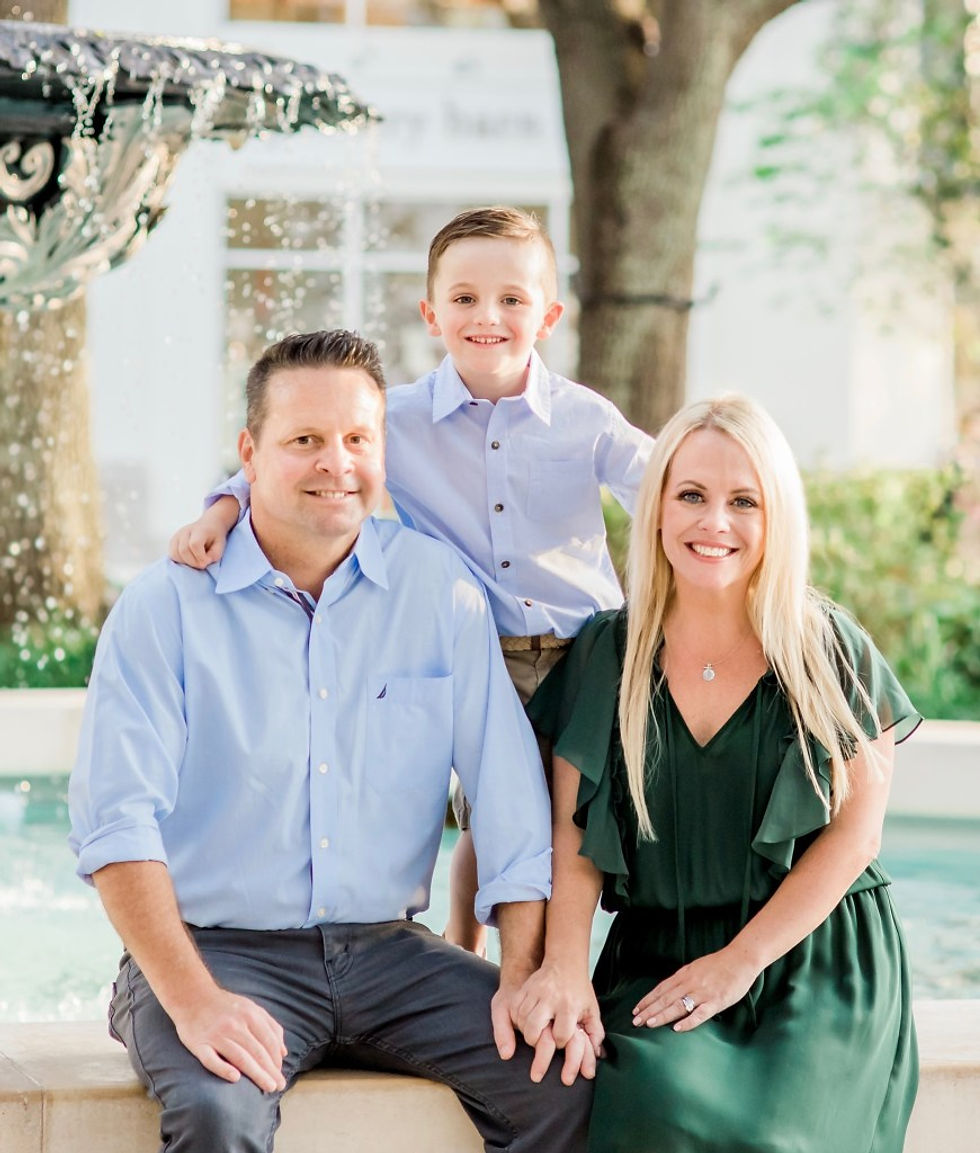 image of Robyn Loughran, her husband and their son