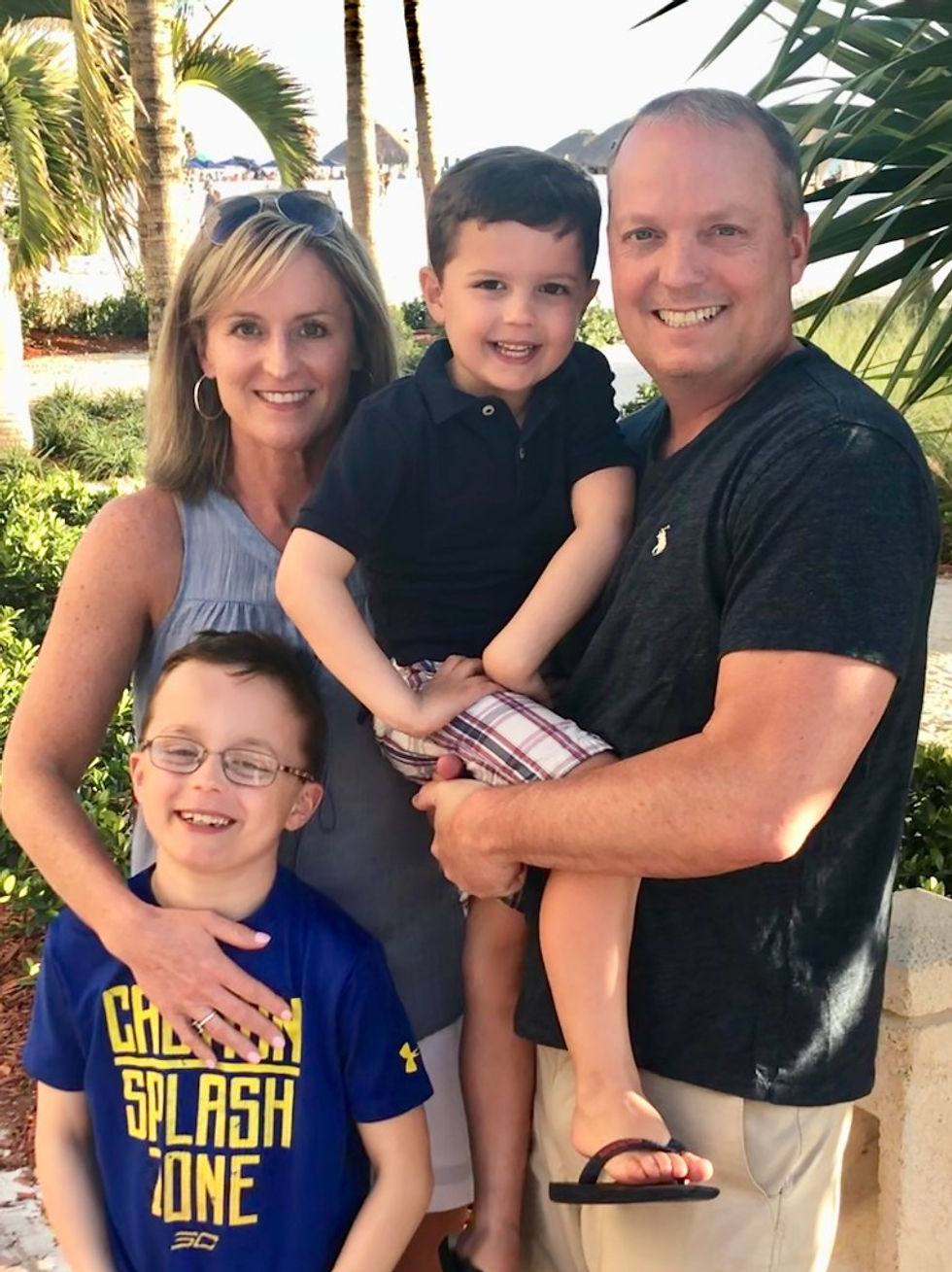 Image of Shannon Lyman, her husband and their 2 sons