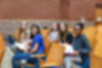 highschool students rehearsing script in theater