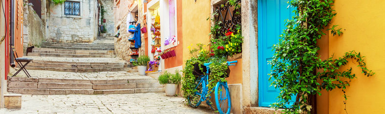 Streets of Rovinj with colorful building facades, Istria, Croatia.jpg