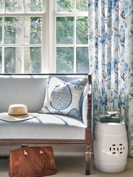 Inviting Settee is a love place to read in the morning sun