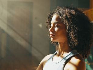 A woman practicing breathwork