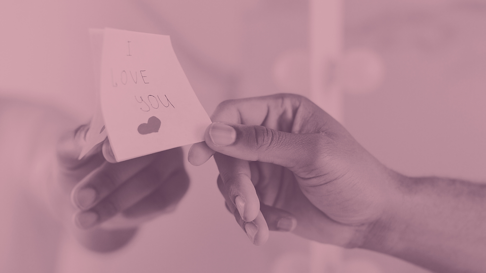 A love note being put on a surface