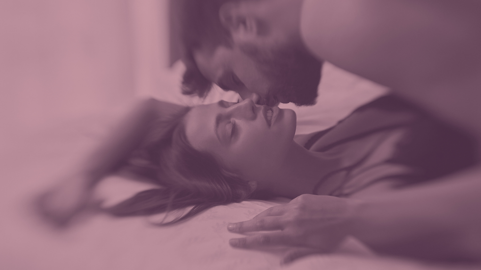 A couple having sex in bed