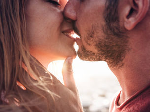 A couple about to kiss