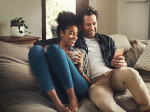 A couple using a phone