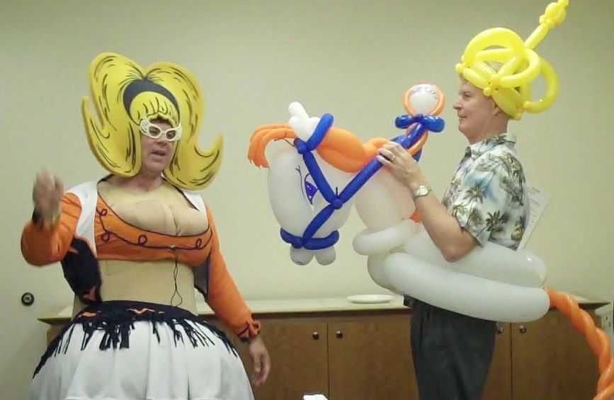 Denver Singing Telegram in Highlands ranch with Denver Bronco cheerleader with balloons