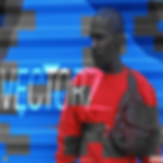 man with red sweater with red bag standing in front of wall