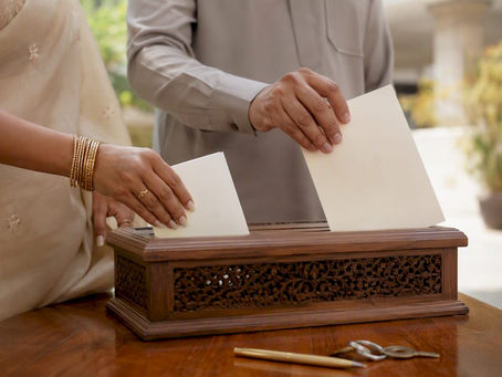 Couple submitting marriage registration documents