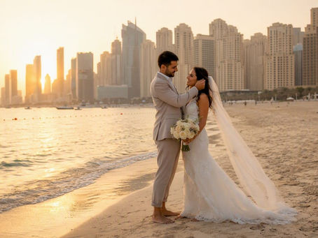 Bride and groom walking at Dubai Marina at sunset