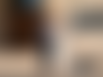 Couple outside Abu Dhabi court holding documents